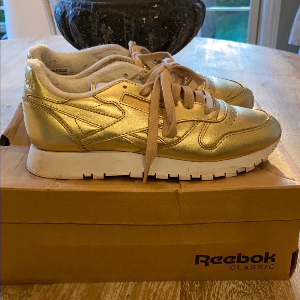 Metallic gold Reebok’s